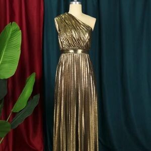 Metallic gold pleated floor-length evening gown
